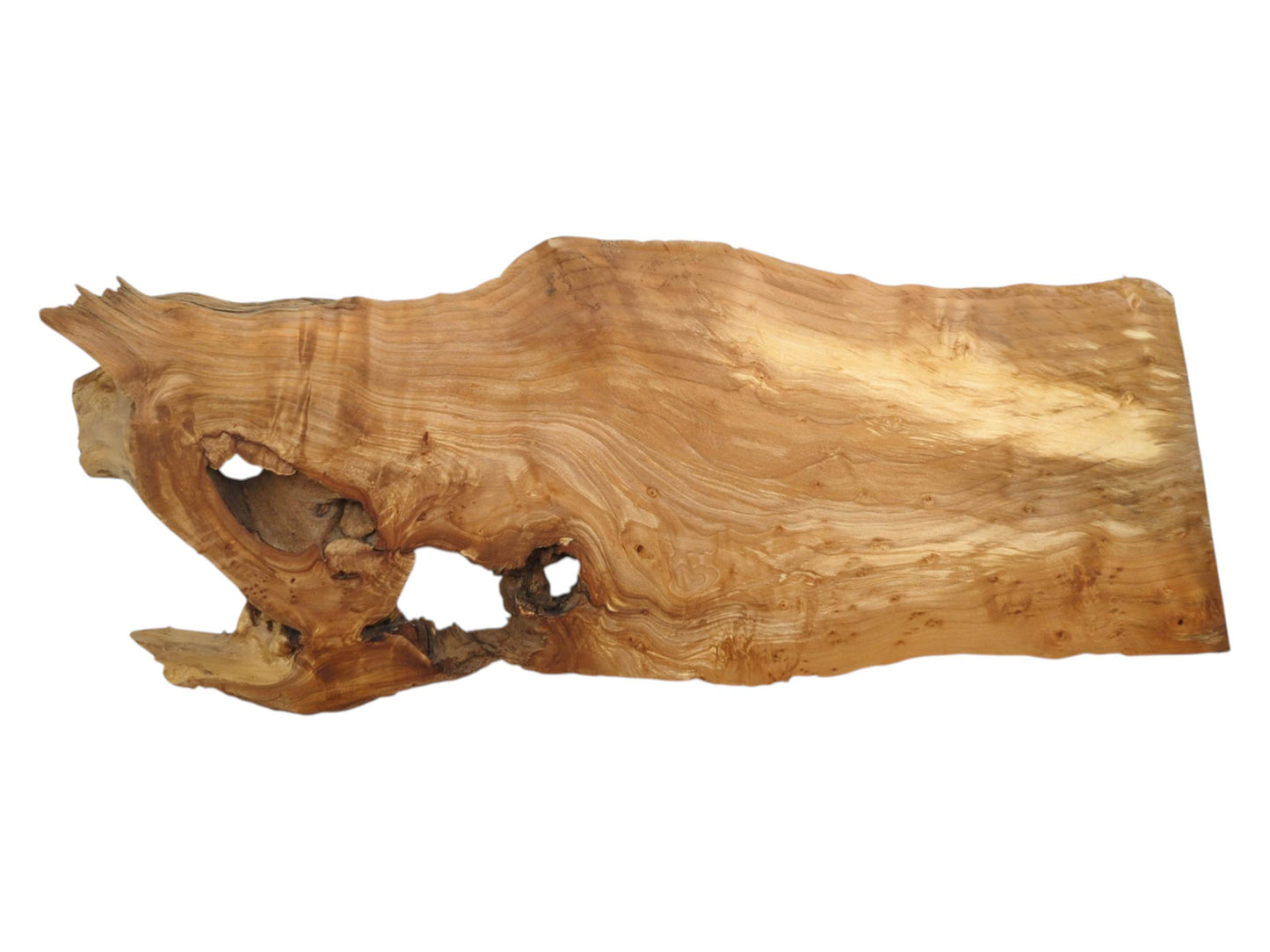 Flowing golden grain patterns swirl across a polished wood slab with large, organic side openings.
