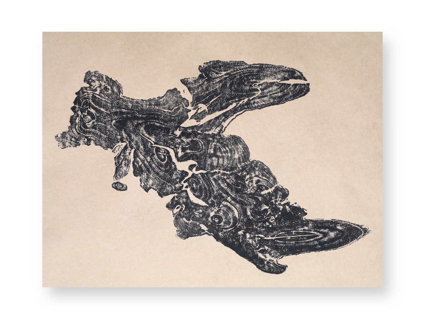 Dark black, textured tree root impression showing complex organic patterns on light brown paper.