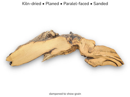 Image displaying text details above an arched, light tan wood slice with dark bark edges.