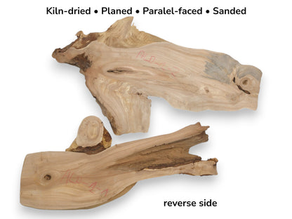 Two planed alder sections show a smooth, pale face and a darker, bark-covered reverse side.