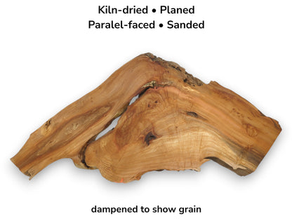 A forked alder wood section displays rich, warm tones, swirling grain, and rugged live edges.