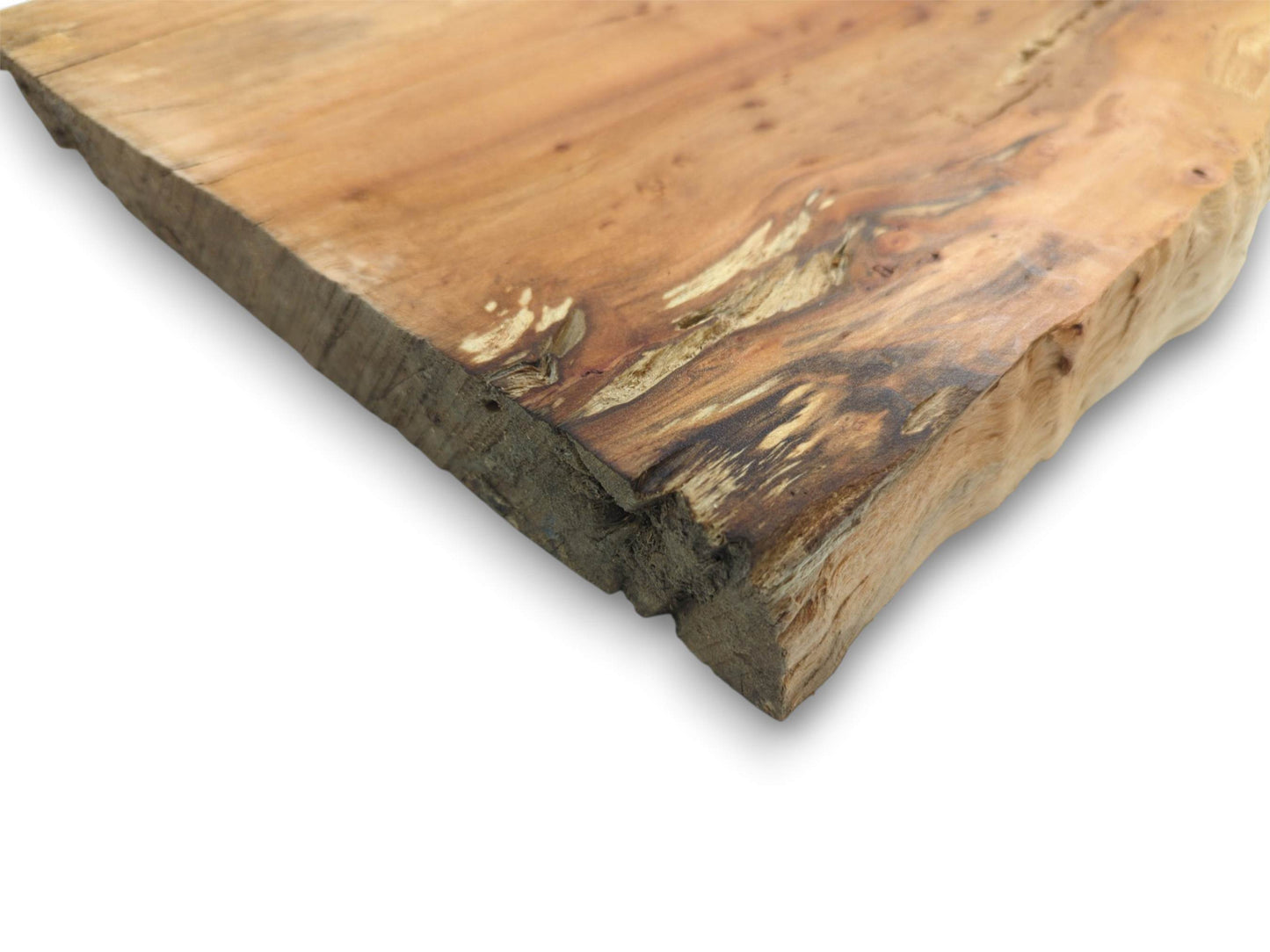 A corner perspective on a timber slab reveals dark staining and a coarse, unfinished edge.