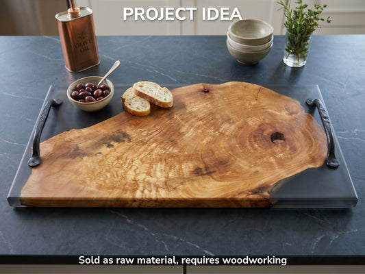 A golden, figured wood slab with a large knot hole is cast in smoky resin.