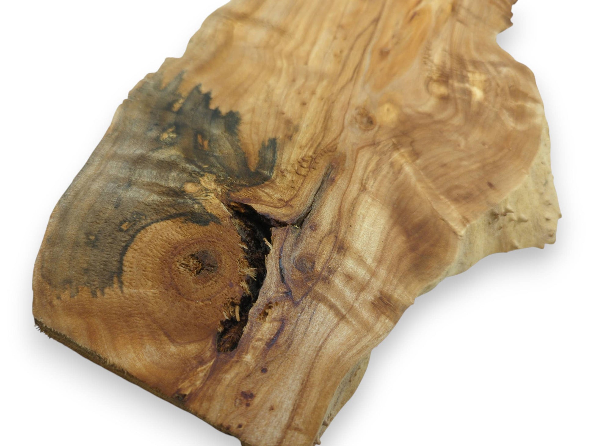 Close-up of a single alder wood slab with a prominent dark knot and natural crack.