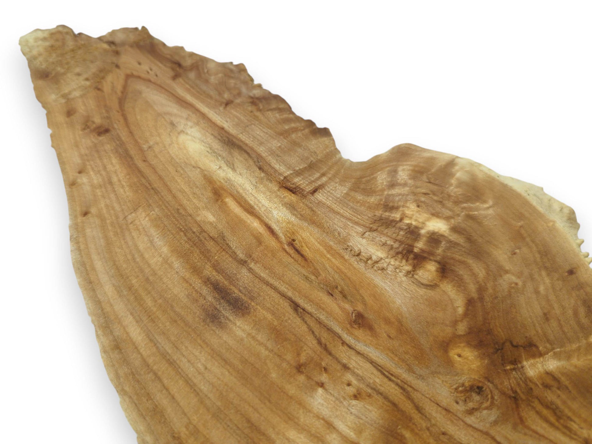 A single light brown alder wood slab with a natural live edge and prominent wood grain.