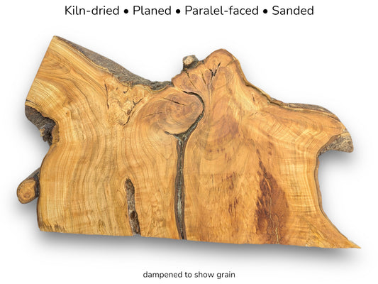 Informational image: An irregular, light brown live edge cherry wood slice. Text lists kiln-dried, planed, parallel-faced, sanded, dampened.