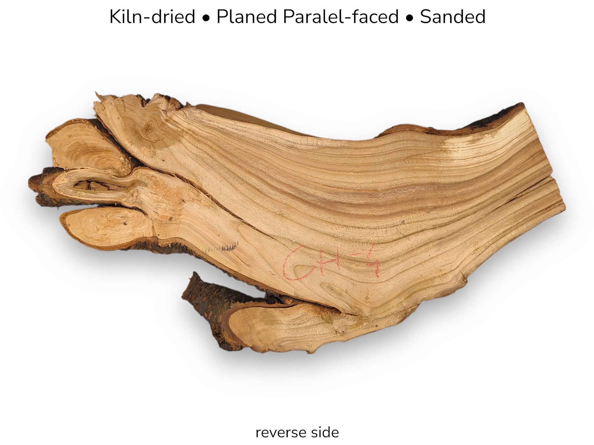 A flattened cherry root slab with clustered knots and long, sweeping grain lines.