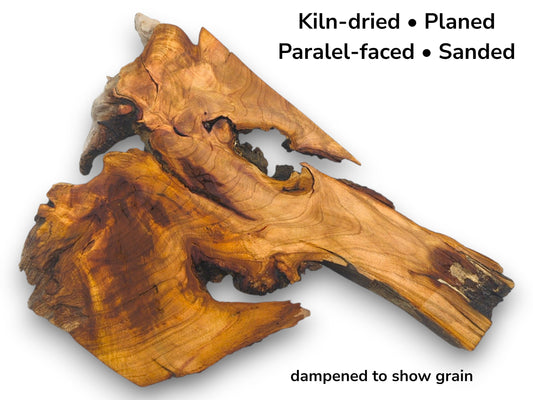A dampened wild cherry slab with text detailing its preparation: kiln-dried, planed, parallel-faced, and sanded.