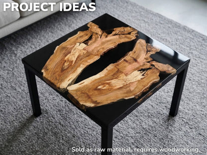 A completed project example showing a square coffee table made with wood slabs and black epoxy.