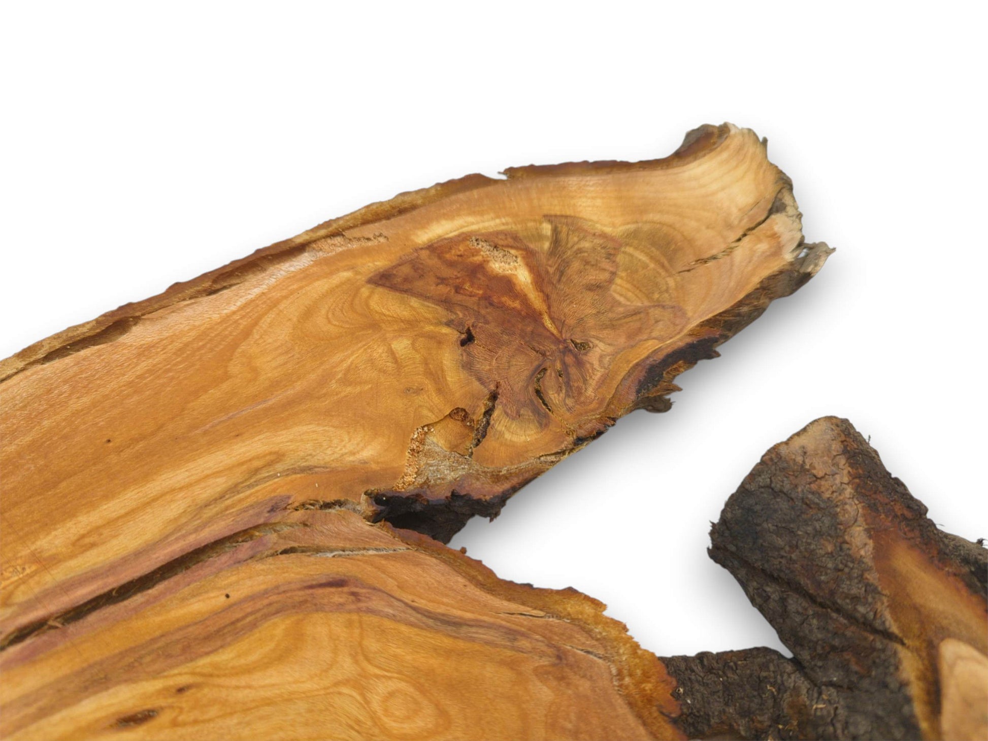 A detailed, diagonal view of two cherry wood slabs, emphasizing a prominent knot and cracks.