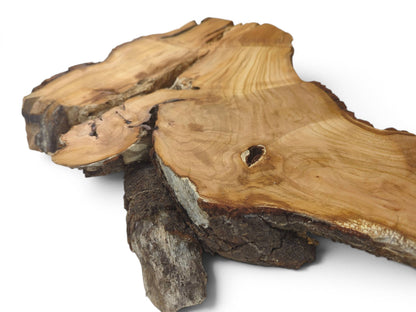 Two light brown wood slabs with live edges and visible grain, one with a small knot.