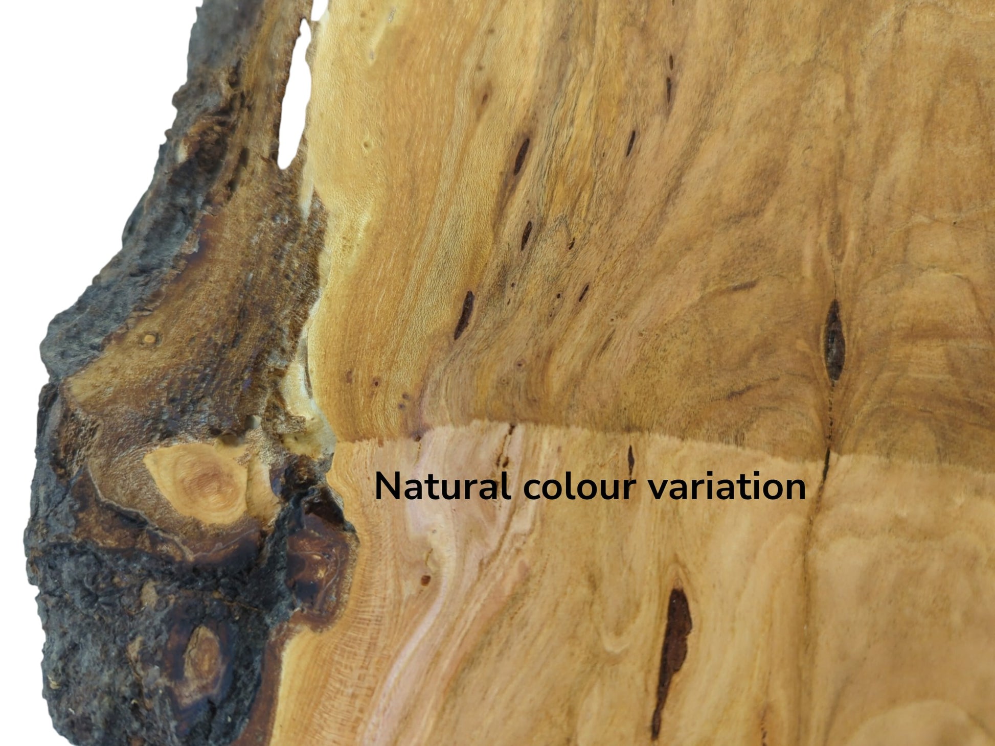 Close-up of a wild cherry wood slab with dark bark and natural color variation.