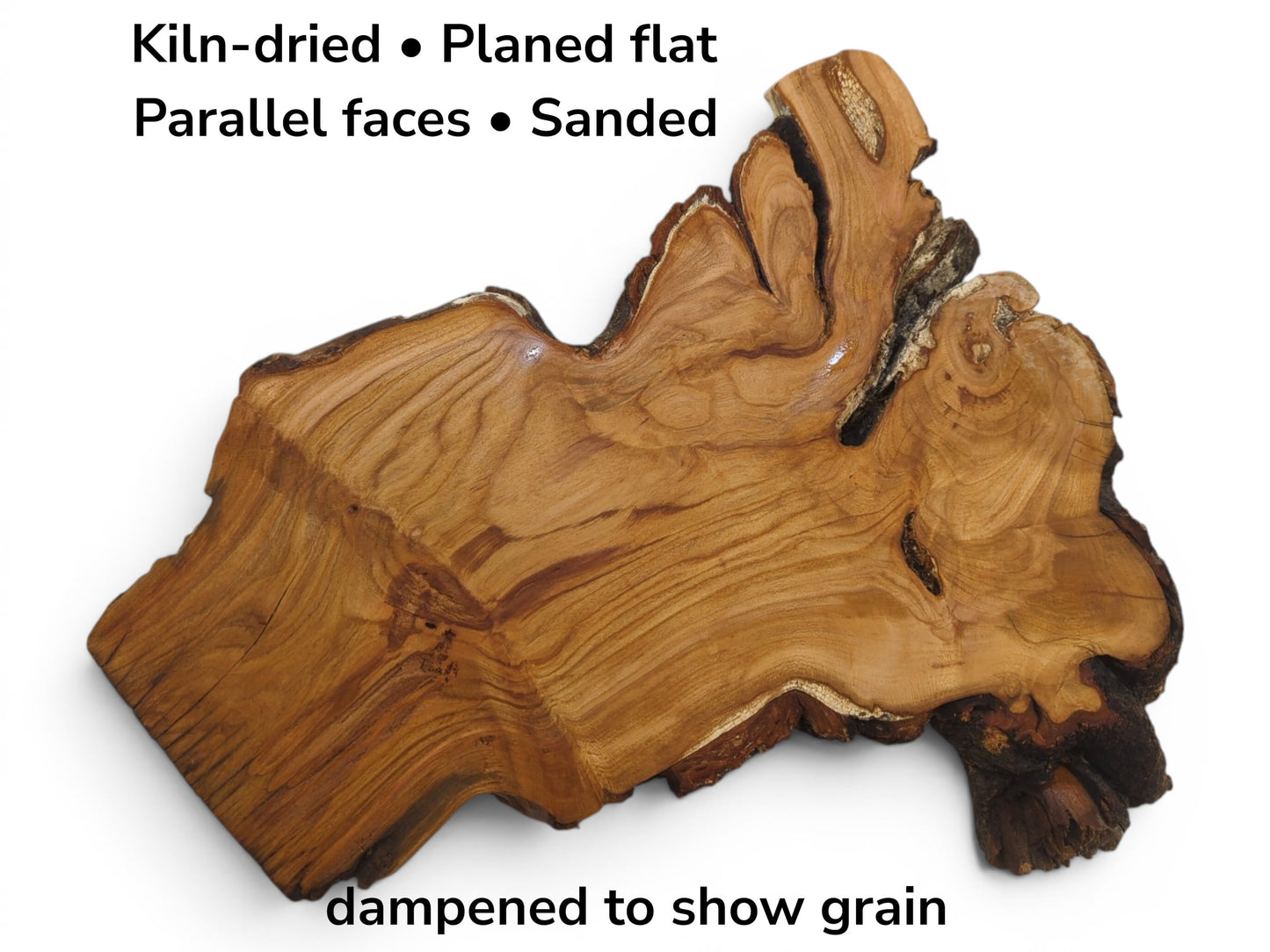 A kiln-dried, planed, sanded, and parallel-faced wild cherry wood slab with live edges.