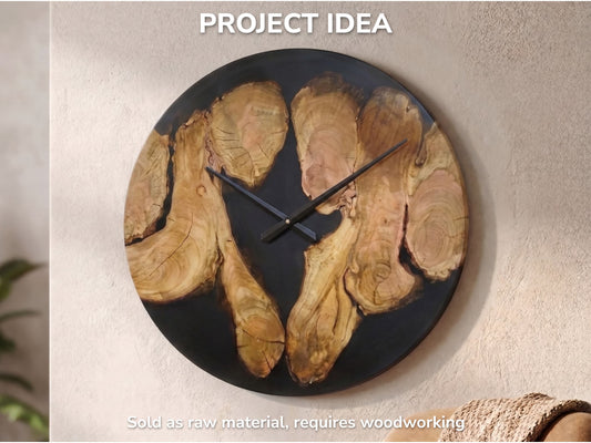 A large round clock made from wild cherry wood slices and black epoxy resin, hanging on a wall.