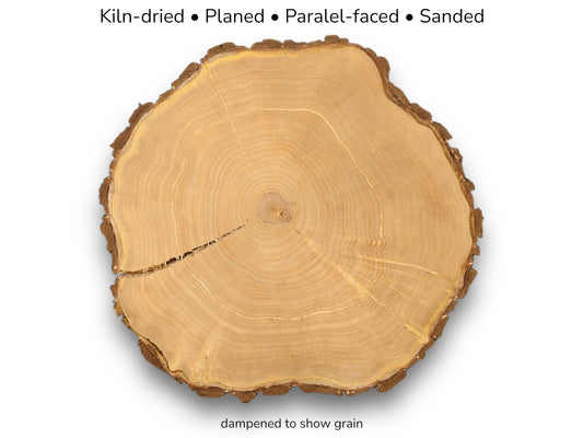Wood round with bark, visible annual rings, and a central crack, shown with descriptive text.