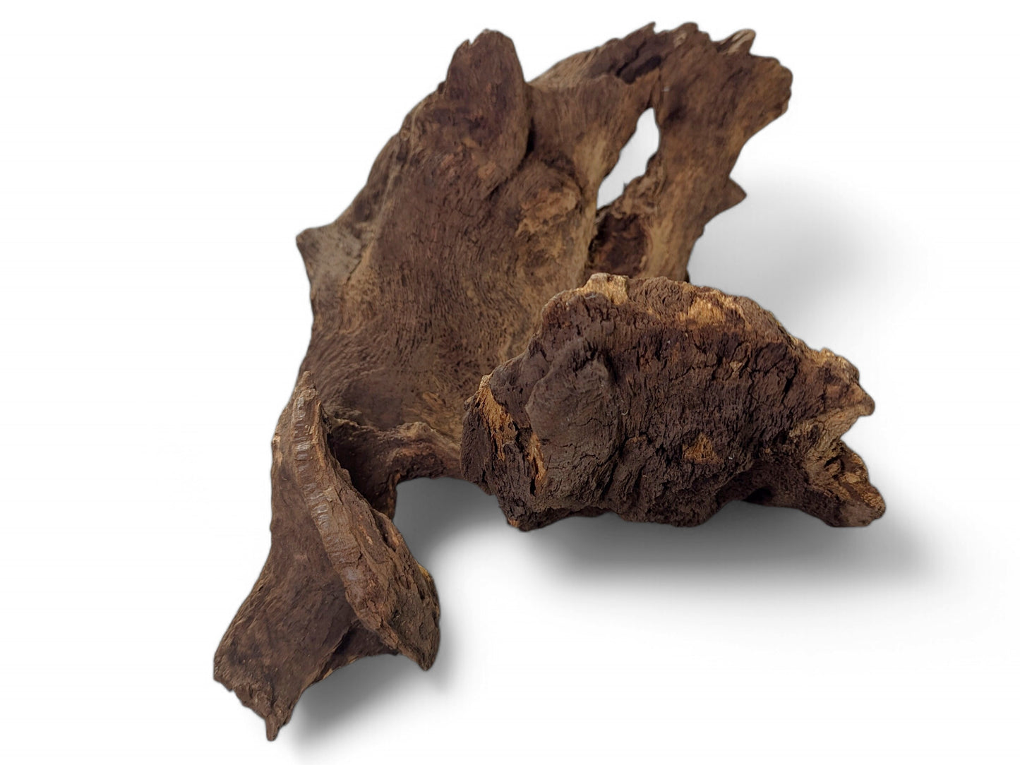 Rugged, dark brown aged wood piece with an irregular shape and gnarled, deeply textured surface.