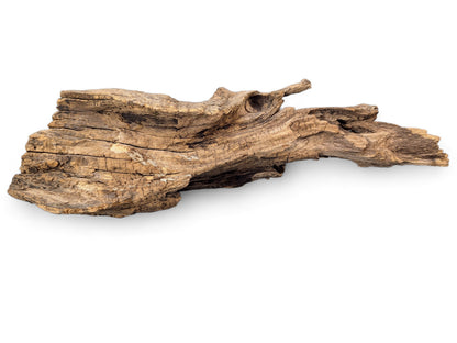 An irregularly shaped piece of natural, weathered brown driftwood with rough, cracked texture on a white background.