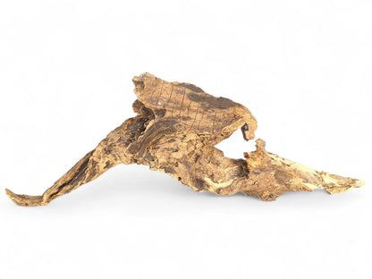 Weathered, light brown driftwood piece with an organic, twisted shape, deeply textured surface, and visible grain.