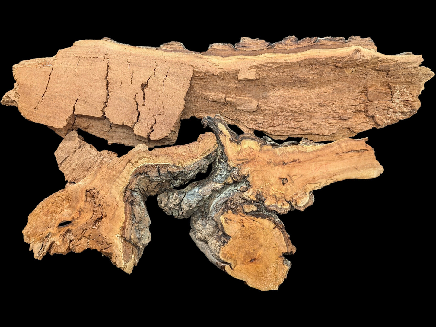 Multiple irregular weeping willow wood pieces display natural grain, bark, and decay-like textures.