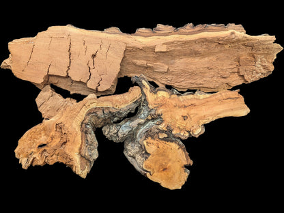 Multiple irregular weeping willow wood pieces display natural grain, bark, and decay-like textures.
