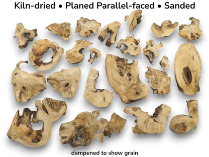 Many kiln-dried, planed, parallel-faced, and sanded elderberry wood pieces with natural edges.