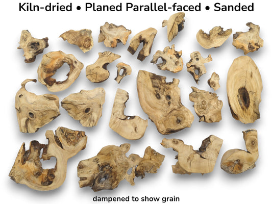 Many kiln-dried, planed, parallel-faced, and sanded elderberry wood pieces with natural edges.