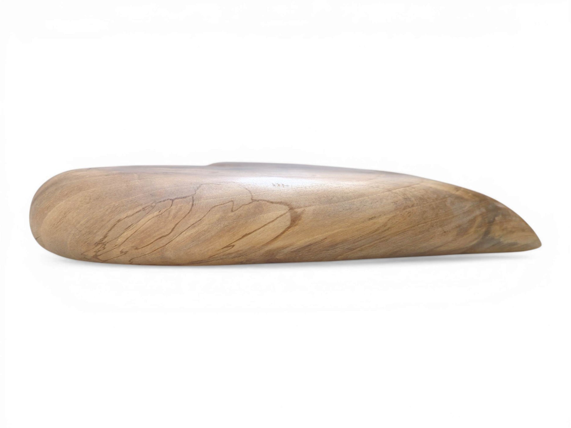 Fine, dark lines of grain follow the thick, rounded profile of a carved timber heart.