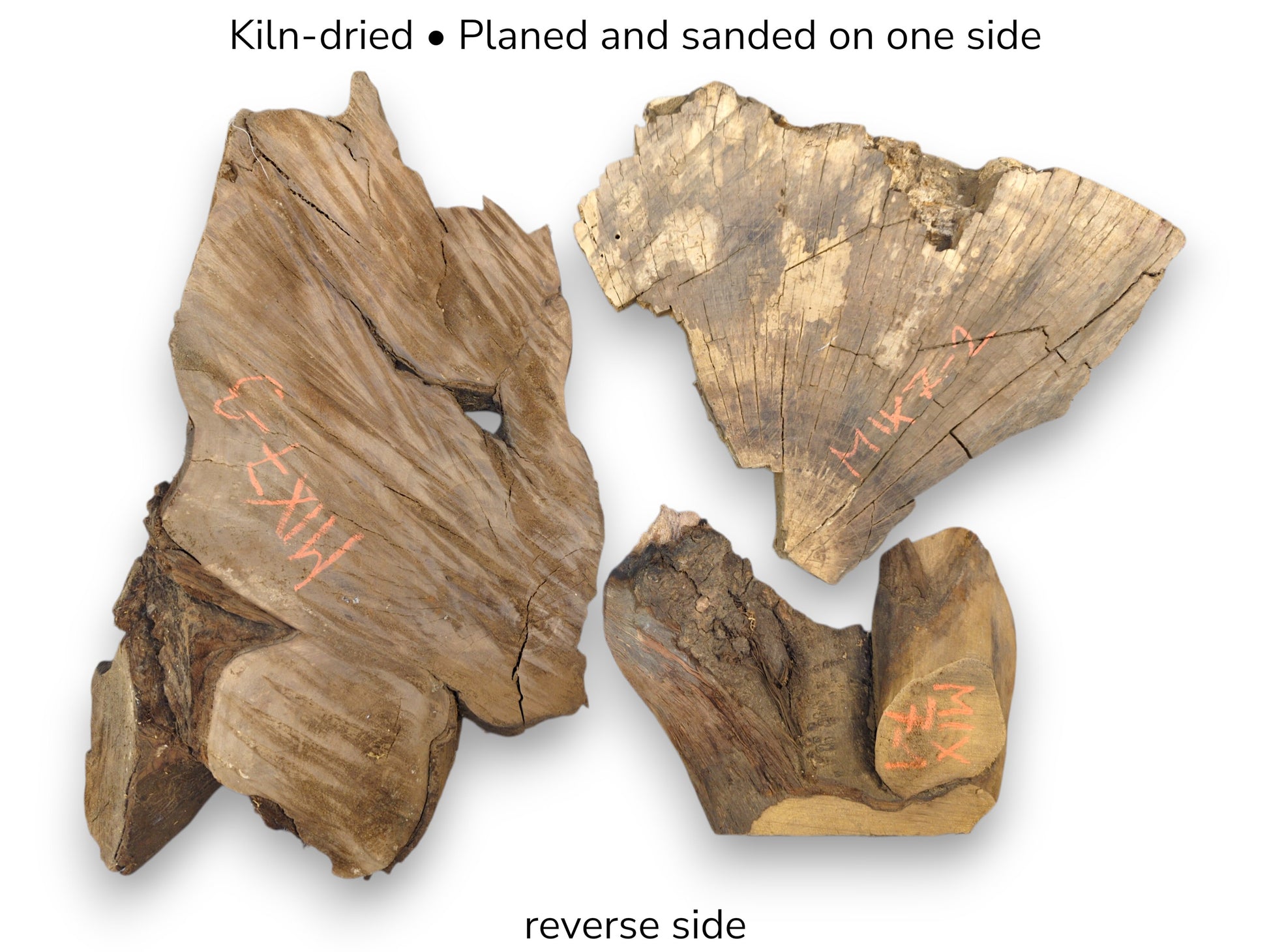 Brown, irregular wood pieces with orange codes and cracks. Overlaid text notes 'Kiln-dried' and 'reverse side'.