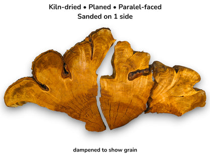 Three split cherry root slabs feature contoured grain, dark inclusions, and a rugged bark edge.