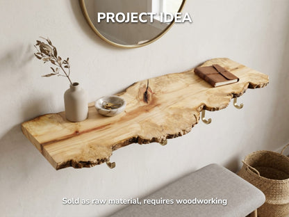 A light-toned timber slab features a dark, linear split and an undulating live perimeter.