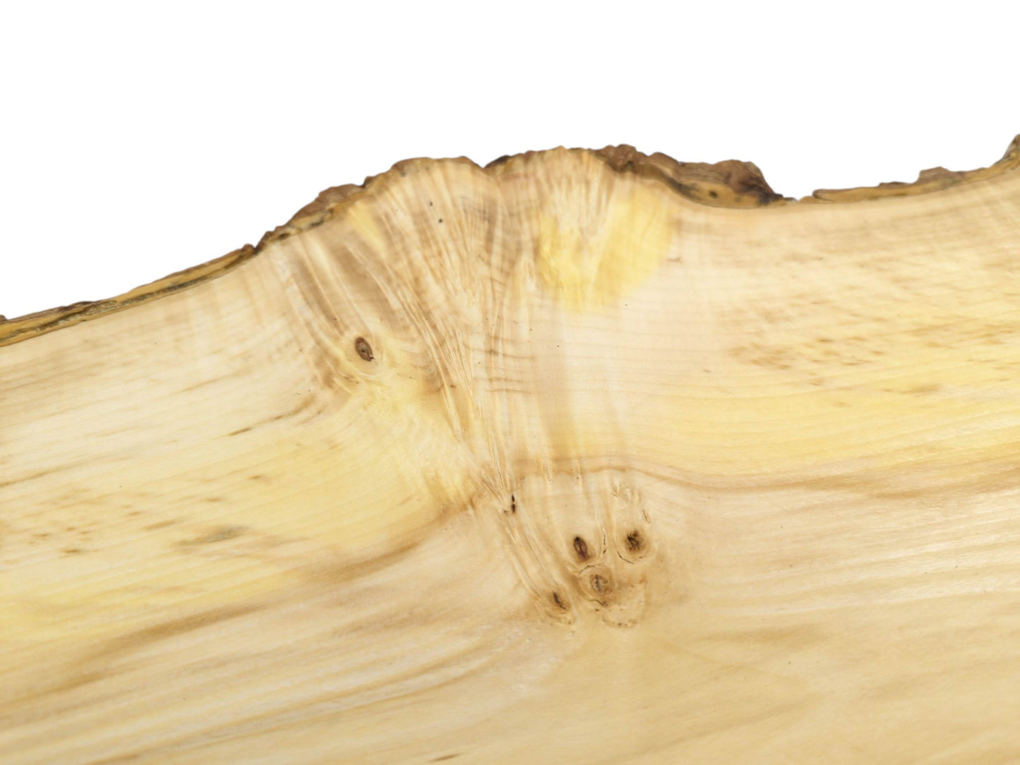 A pale timber section with a feathered grain radiating from a cluster of dark knots.