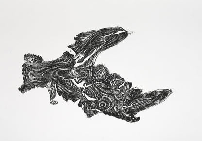 Print showing a dark, gnarled root impression with natural wood grain patterns on white art paper.