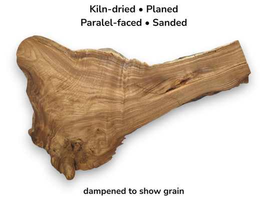 Contoured grain patterns sweep across an irregular timber section with a knotty burl on one end.