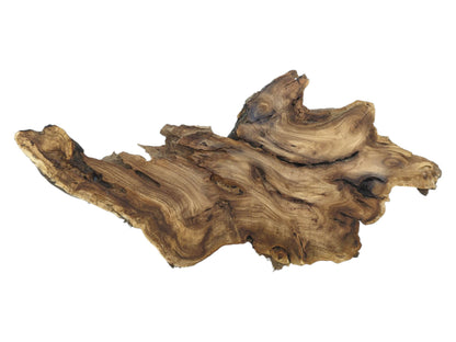 Rippling bands of dark and light grain flow across a raw, craggy timber section.