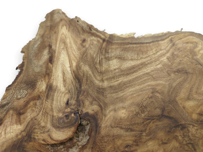 A wood cross-section shows flowing, contoured grain patterns and a rough, irregular live edge.