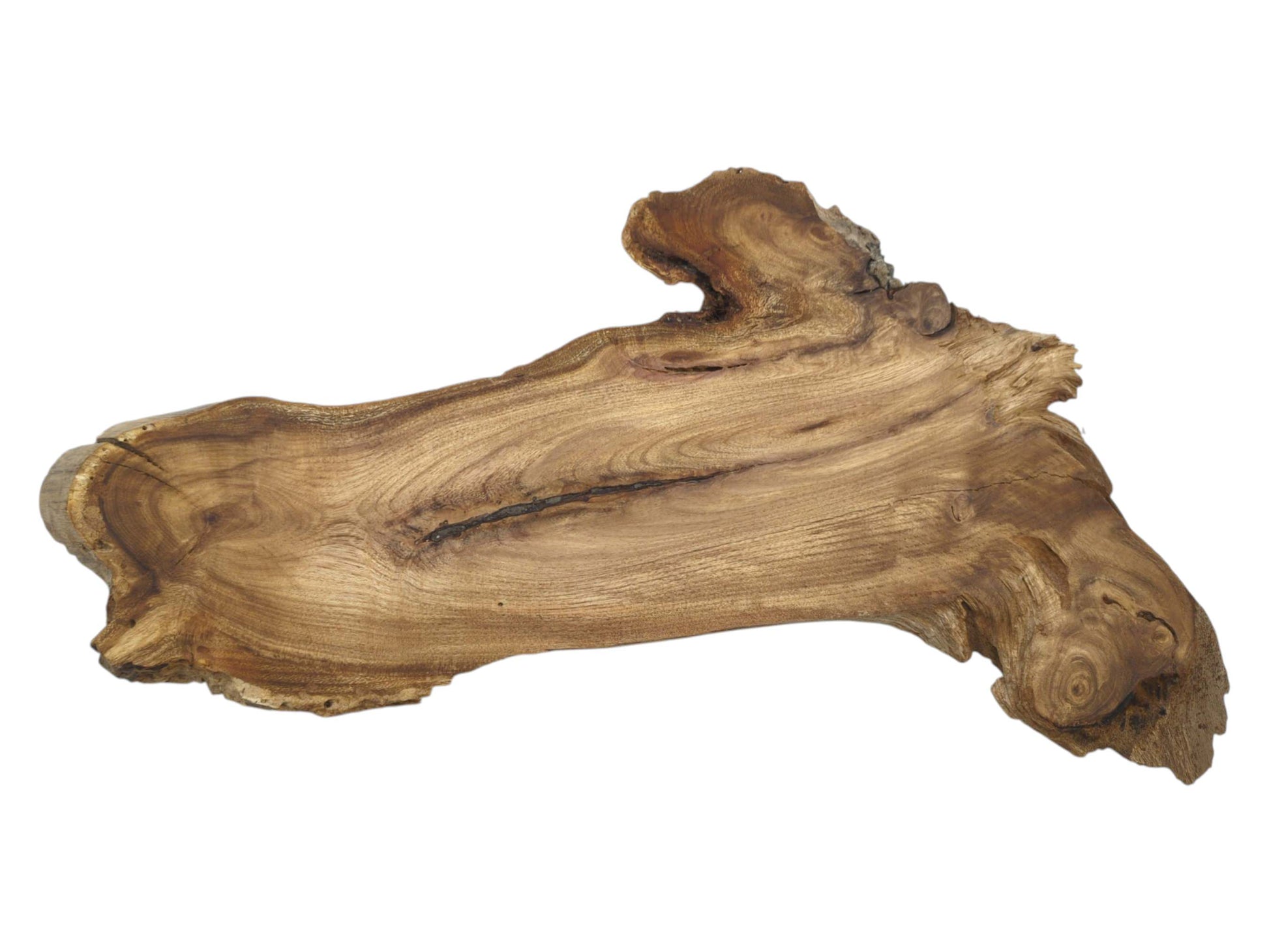 Undulating grain patterns flow around a dark central fissure on this rustic, natural-edge timber piece.