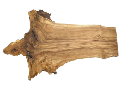 A wide lumber slab displays a large, knotty burl with grain swirling into linear patterns.