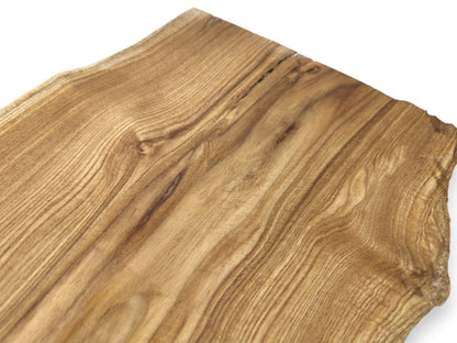 An angled perspective highlights the rippling grain and a split edge on a timber slab.