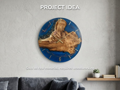 A golden-grained wood burl floats in deep blue resin, crafted into a modern clock.