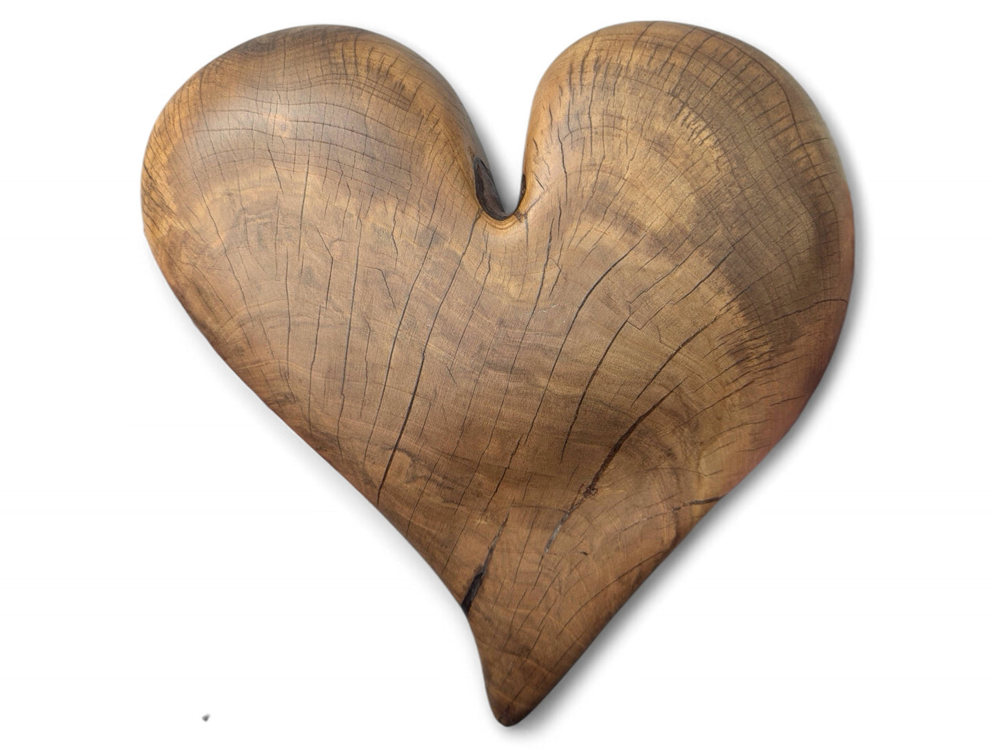 Sculpted brown hardwood heart with distinct wood grain, visible fissures, and a smooth oiled finish.