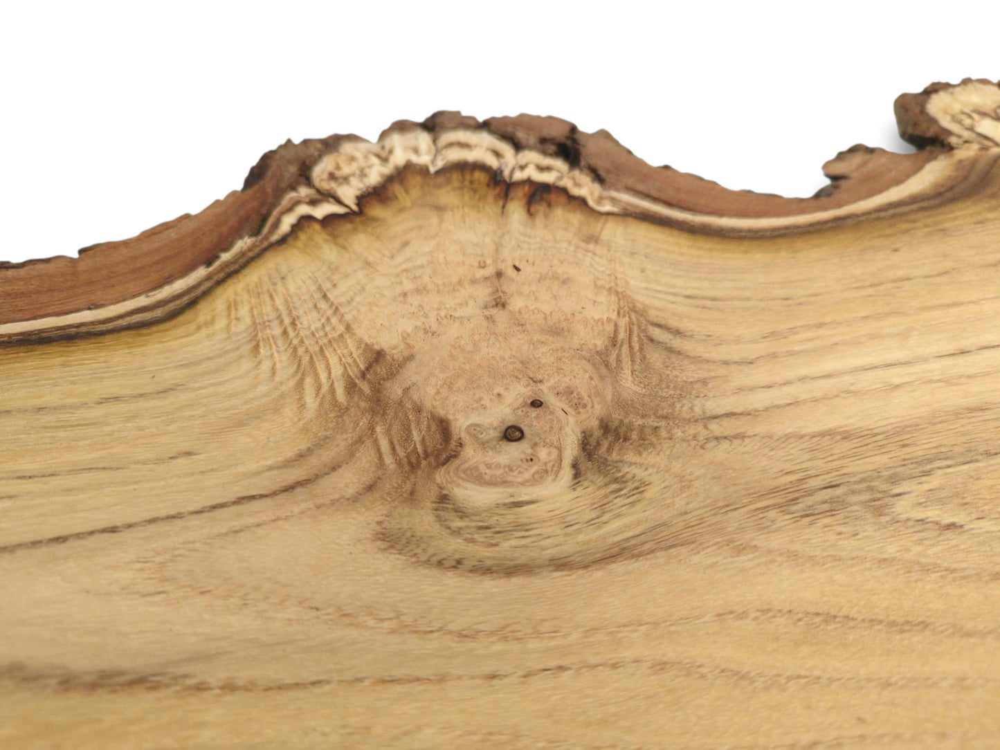 A close-up of a black locust slab shows grain flowing from a knot to the live edge.