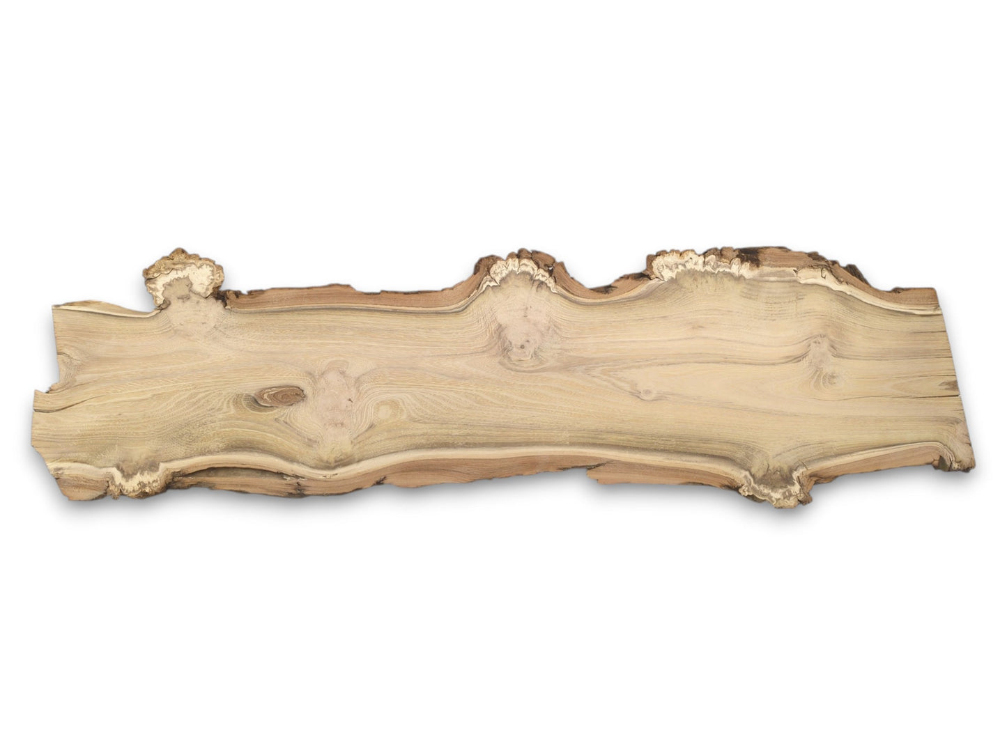 A long, live edge black locust slab is isolated on a white background.