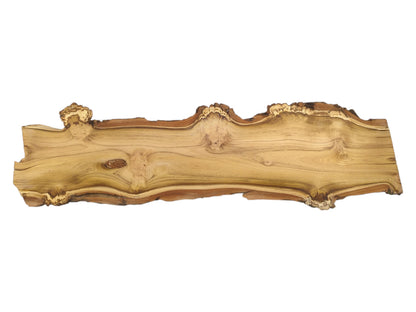 The entire black locust slab is displayed, highlighting its organic live edge and wood knots.
