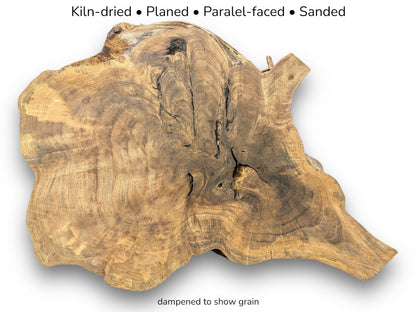 Irregular walnut root slice showing rich brown grain patterns with text listing kiln-dried and sanded specifications.