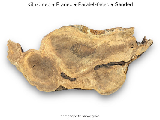 Irregular golden-brown walnut slice displaying dark grain, with text listing kiln-dried, planed, and sanded details.