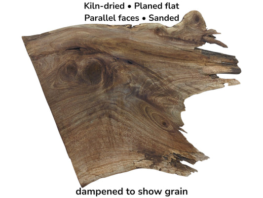 A kiln-dried, planed, sanded walnut wood slab with parallel faces and natural live edges.