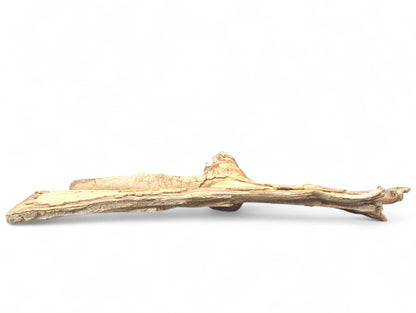 Horizontal, light brown driftwood piece with a flattened middle section and deeply fissured texture.