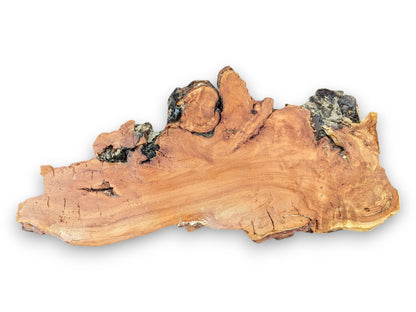 An irregular weeping willow wood slab with light brown grain, dark rugged bark, and a fragile, cracked texture.