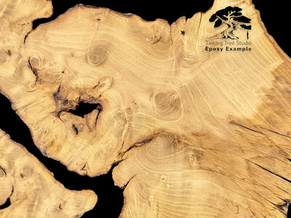 Close-up detailed view of light brown wood grain, knots, and voids with text overlay stating epoxy example.