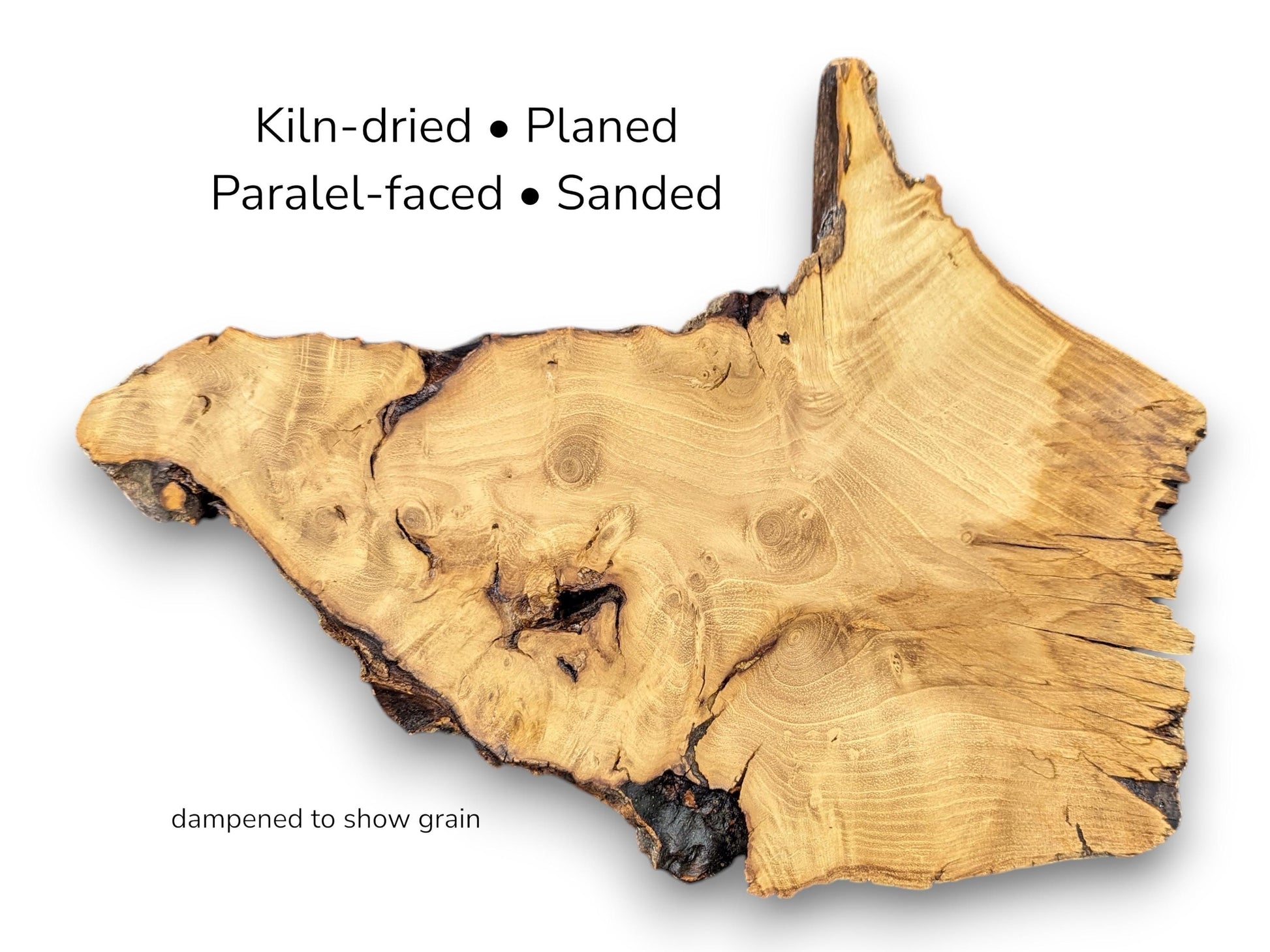 Irregular light brown wood slice showing grain patterns with text overlay indicating kiln-dried and sanded status.
